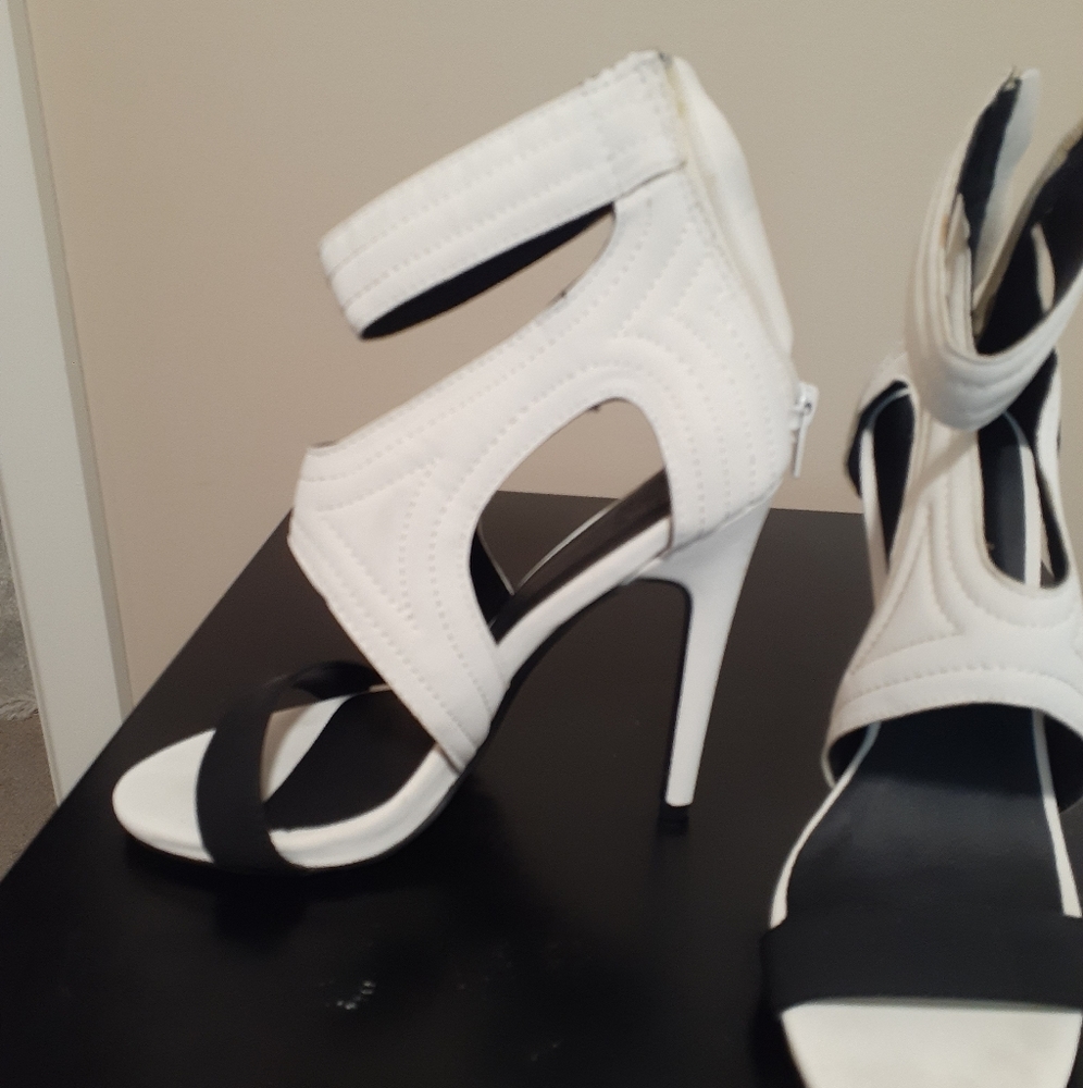 White and black heels